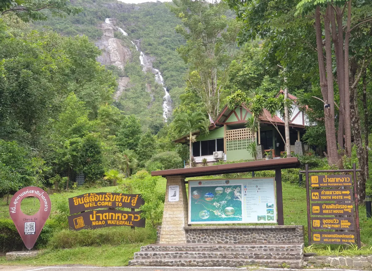 Namtok Ngao National Park in Ranong, with a tall waterfall surrounded by tropical rainforest