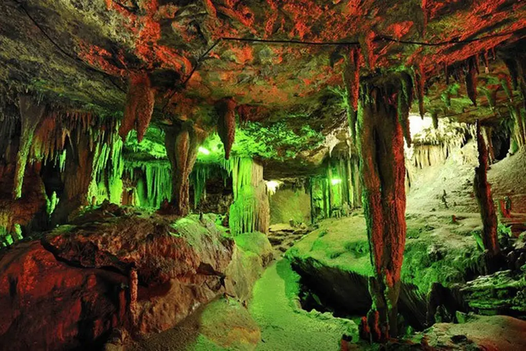 Tham Le Khao Kob in Trang Province, an underground river cave explored by paddle boat through narrow limestone passages