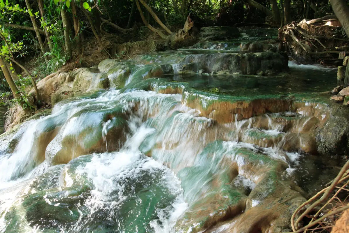 Khlong Thom Hot Springs in Krabi, a natural warm-water waterfall surrounded by tropical forest