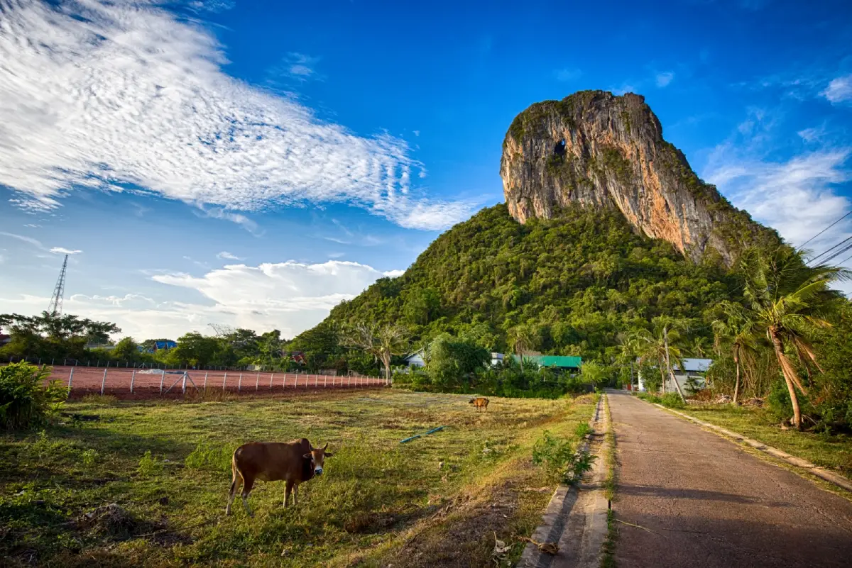 Khao Ok Thalu in Phatthalung, a limestone mountain with a distinctive opening through the rock